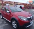 Червоний Дачія Sandero, об'ємом двигуна 1.6 л та пробігом 252 тис. км за 6750 $, фото 1 на Automoto.ua