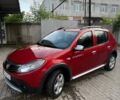 Красный Дачия Сандеро, объемом двигателя 1.6 л и пробегом 157 тыс. км за 6750 $, фото 1 на Automoto.ua