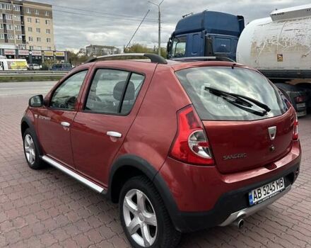 Дачия Сандеро 2011 в Виннице на Automoto.ua Красный Дачия Сандеро, объемом двигателя 1.6 л и пробегом 115 тыс. км за 6950 $, фото 2 на Automoto.ua