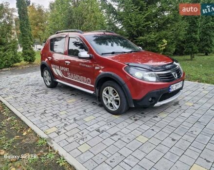 Красный Дачия Сандеро, объемом двигателя 1.6 л и пробегом 200 тыс. км за 6900 $, фото 8 на Automoto.ua
