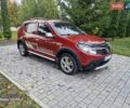 Красный Дачия Сандеро, объемом двигателя 1.6 л и пробегом 200 тыс. км за 6900 $, фото 1 на Automoto.ua