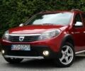 Красный Дачия Сандеро, объемом двигателя 1.6 л и пробегом 143 тыс. км за 5600 $, фото 1 на Automoto.ua
