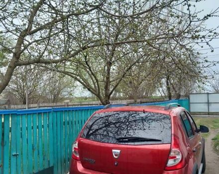 Красный Дачия Сандеро, объемом двигателя 1.6 л и пробегом 188 тыс. км за 6499 $, фото 1 на Automoto.ua