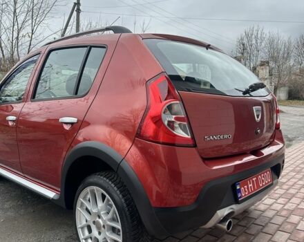 Красный Дачия Сандеро, объемом двигателя 1.6 л и пробегом 172 тыс. км за 6799 $, фото 22 на Automoto.ua