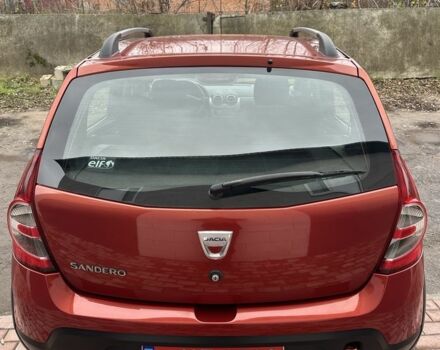 Красный Дачия Сандеро, объемом двигателя 1.6 л и пробегом 172 тыс. км за 6799 $, фото 5 на Automoto.ua
