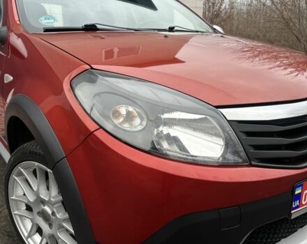 Красный Дачия Сандеро, объемом двигателя 1.6 л и пробегом 172 тыс. км за 6799 $, фото 16 на Automoto.ua