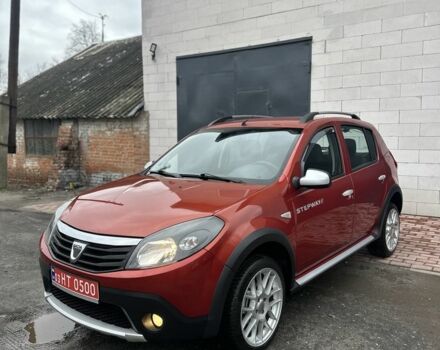 Красный Дачия Сандеро, объемом двигателя 1.6 л и пробегом 172 тыс. км за 6799 $, фото 1 на Automoto.ua