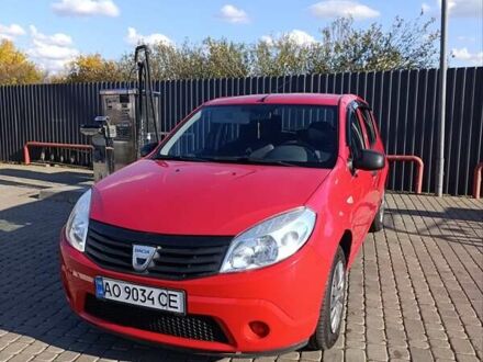 Красный Дачия Сандеро, объемом двигателя 1.39 л и пробегом 224 тыс. км за 3999 $, фото 1 на Automoto.ua