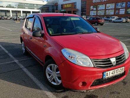 Красный Дачия Сандеро, объемом двигателя 1.4 л и пробегом 286 тыс. км за 3450 $, фото 1 на Automoto.ua