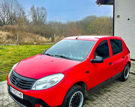 Красный Дачия Сандеро, объемом двигателя 1.39 л и пробегом 200 тыс. км за 3500 $, фото 1 на Automoto.ua