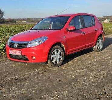 Красный Дачия Сандеро, объемом двигателя 1.4 л и пробегом 206 тыс. км за 4300 $, фото 1 на Automoto.ua