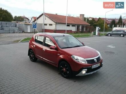 Красный Дачия Сандеро, объемом двигателя 1.4 л и пробегом 140 тыс. км за 6150 $, фото 1 на Automoto.ua