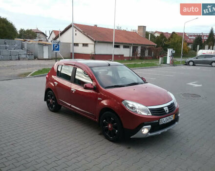 Червоний Дачія Sandero, об'ємом двигуна 1.4 л та пробігом 140 тис. км за 6150 $, фото 1 на Automoto.ua