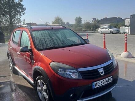 Красный Дачия Сандеро, объемом двигателя 1.6 л и пробегом 220 тыс. км за 6400 $, фото 1 на Automoto.ua