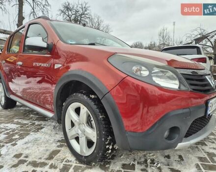 Красный Дачия Сандеро, объемом двигателя 1.6 л и пробегом 194 тыс. км за 6700 $, фото 1 на Automoto.ua