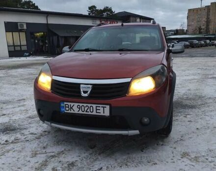 Красный Дачия Сандеро, объемом двигателя 1.6 л и пробегом 131 тыс. км за 5700 $, фото 1 на Automoto.ua