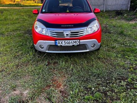 Дачия Сандеро 2010 в Харькове на Automoto.ua Красный Дачия Сандеро, объемом двигателя 1.4 л и пробегом 133 тыс. км за 5000 $, фото 1 на Automoto.ua