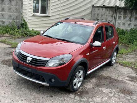 Дачія Sandero 2010 у Фастове на Automoto.ua Червоний Дачія Sandero, об'ємом двигуна 1.6 л та пробігом 164 тис. км за 5700 $, фото 1 на Automoto.ua