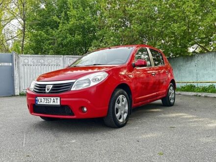 Червоний Дачія Sandero, об'ємом двигуна 1.4 л та пробігом 326 тис. км за 5499 $, фото 1 на Automoto.ua