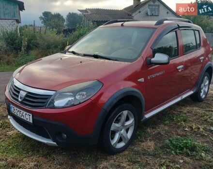 Червоний Дачія Sandero, об'ємом двигуна 1.6 л та пробігом 143 тис. км за 6800 $, фото 1 на Automoto.ua