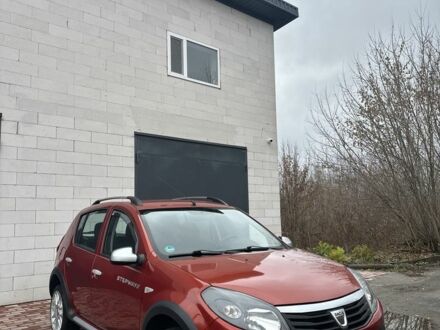 Красный Дачия Сандеро, объемом двигателя 1.6 л и пробегом 172 тыс. км за 6799 $, фото 1 на Automoto.ua