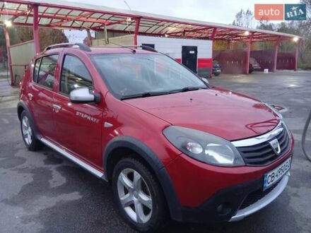 Красный Дачия Сандеро, объемом двигателя 1.6 л и пробегом 252 тыс. км за 6800 $, фото 1 на Automoto.ua