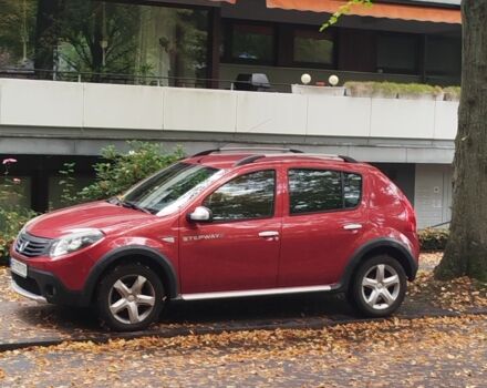 Червоний Дачія Sandero, об'ємом двигуна 2 л та пробігом 200 тис. км за 6398 $, фото 1 на Automoto.ua