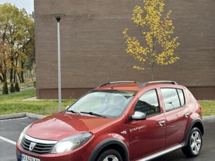 Красный Дачия Сандеро, объемом двигателя 1.6 л и пробегом 168 тыс. км за 6200 $, фото 1 на Automoto.ua