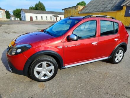 Красный Дачия Сандеро, объемом двигателя 6 л и пробегом 157 тыс. км за 6350 $, фото 1 на Automoto.ua