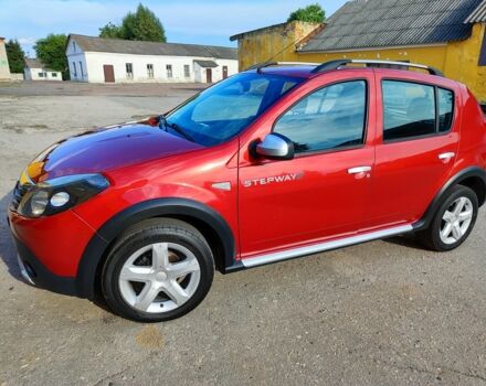 Красный Дачия Сандеро, объемом двигателя 6 л и пробегом 157 тыс. км за 6350 $, фото 1 на Automoto.ua