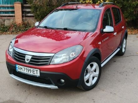 Красный Дачия Сандеро, объемом двигателя 1.6 л и пробегом 162 тыс. км за 6400 $, фото 1 на Automoto.ua