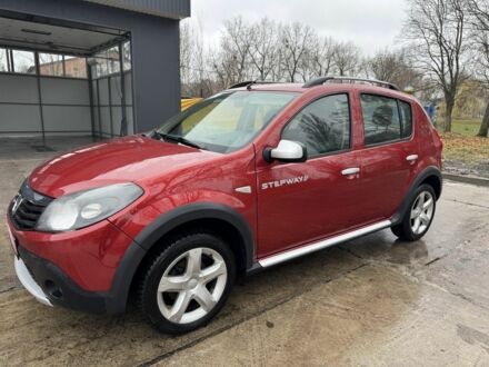 Красный Дачия Сандеро, объемом двигателя 1.6 л и пробегом 185 тыс. км за 7350 $, фото 1 на Automoto.ua