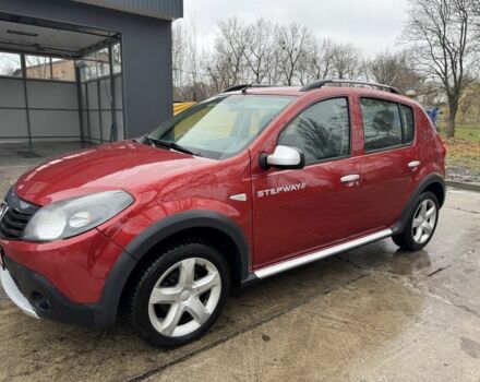 Червоний Дачія Sandero, об'ємом двигуна 1.6 л та пробігом 185 тис. км за 7350 $, фото 1 на Automoto.ua