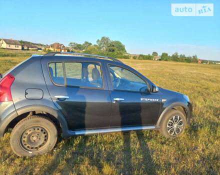 Сірий Дачія Sandero, об'ємом двигуна 1.6 л та пробігом 185 тис. км за 7000 $, фото 8 на Automoto.ua