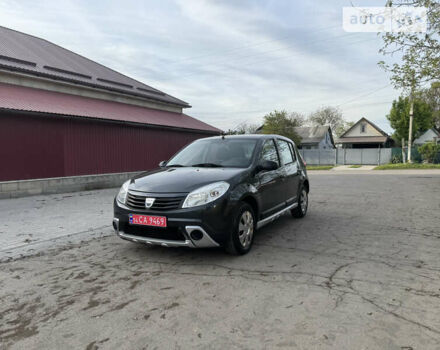 Сірий Дачія Sandero, об'ємом двигуна 1.4 л та пробігом 235 тис. км за 5590 $, фото 1 на Automoto.ua