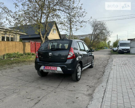 Сірий Дачія Sandero, об'ємом двигуна 1.4 л та пробігом 235 тис. км за 5590 $, фото 18 на Automoto.ua