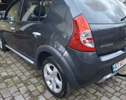 Серый Дачия Сандеро, объемом двигателя 1.6 л и пробегом 200 тыс. км за 6400 $, фото 4 на Automoto.ua