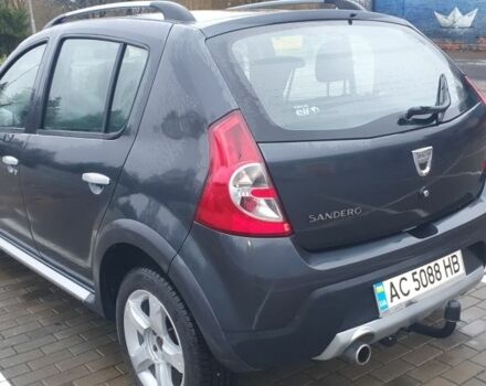 Серый Дачия Сандеро, объемом двигателя 1.6 л и пробегом 188 тыс. км за 6399 $, фото 2 на Automoto.ua