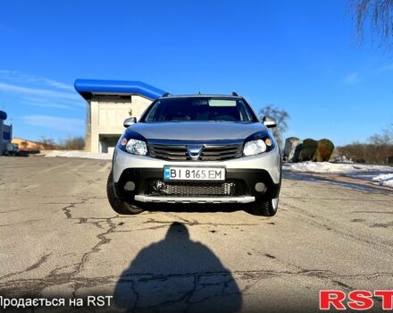 Сірий Дачія Sandero, об'ємом двигуна 1.6 л та пробігом 150 тис. км за 6300 $, фото 4 на Automoto.ua