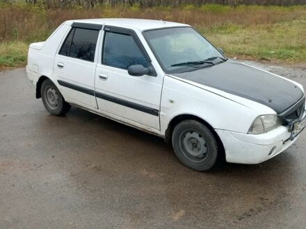 Білий Дачія Solenza, об'ємом двигуна 1.4 л та пробігом 500 тис. км за 1000 $, фото 1 на Automoto.ua