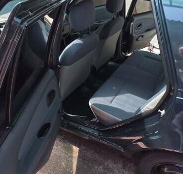 Черный Дачия Соленза, объемом двигателя 1.4 л и пробегом 146 тыс. км за 2600 $, фото 26 на Automoto.ua