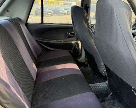 Червоний Дачія Solenza, об'ємом двигуна 1.4 л та пробігом 200 тис. км за 850 $, фото 8 на Automoto.ua