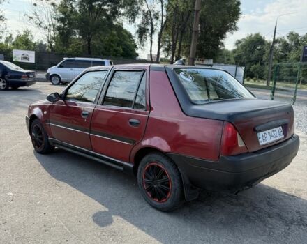 Червоний Дачія Solenza, об'ємом двигуна 1.4 л та пробігом 200 тис. км за 850 $, фото 3 на Automoto.ua