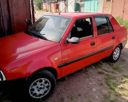 Червоний Дачія Solenza, об'ємом двигуна 1.4 л та пробігом 200 тис. км за 1100 $, фото 1 на Automoto.ua
