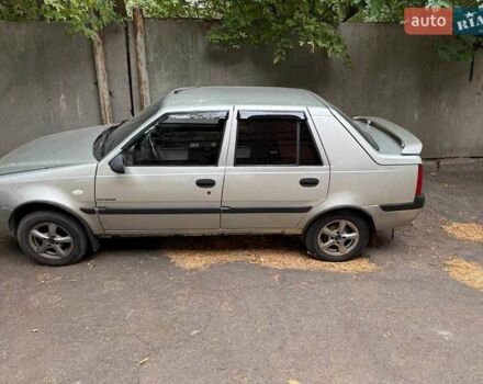 Сірий Дачія Solenza, об'ємом двигуна 1.4 л та пробігом 122 тис. км за 2300 $, фото 2 на Automoto.ua