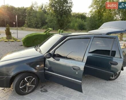Зелений Дачія Solenza, об'ємом двигуна 1.4 л та пробігом 130 тис. км за 2000 $, фото 18 на Automoto.ua
