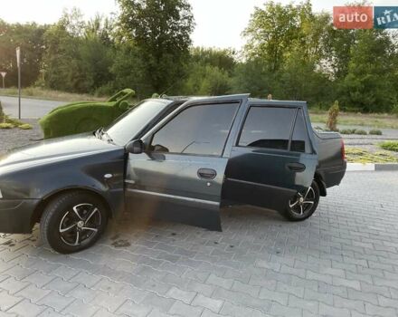 Зелений Дачія Solenza, об'ємом двигуна 1.4 л та пробігом 130 тис. км за 2000 $, фото 14 на Automoto.ua