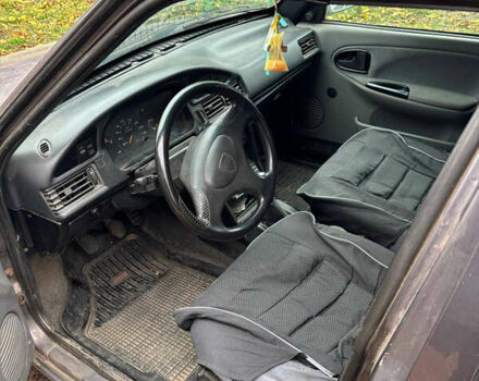 Черный Дачия Супер Нова, объемом двигателя 1.4 л и пробегом 270 тыс. км за 1660 $, фото 3 на Automoto.ua