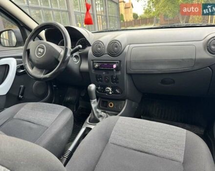 Білий Дачія Duster, об'ємом двигуна 1.6 л та пробігом 186 тис. км за 7400 $, фото 14 на Automoto.ua
