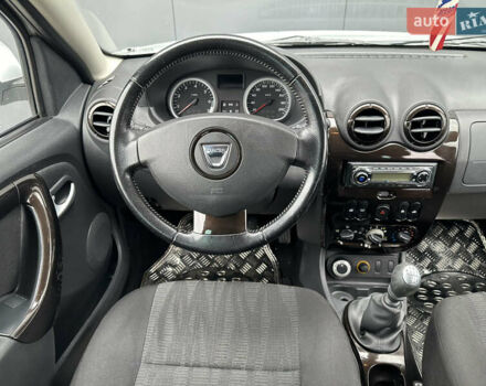 Білий Дачія Duster, об'ємом двигуна 1.6 л та пробігом 243 тис. км за 8750 $, фото 13 на Automoto.ua